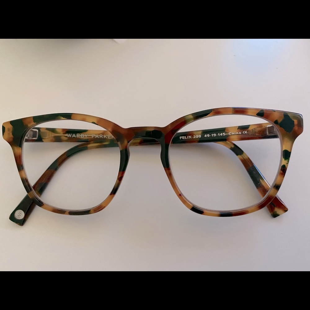 Warby Parker frame. Felix in green tort